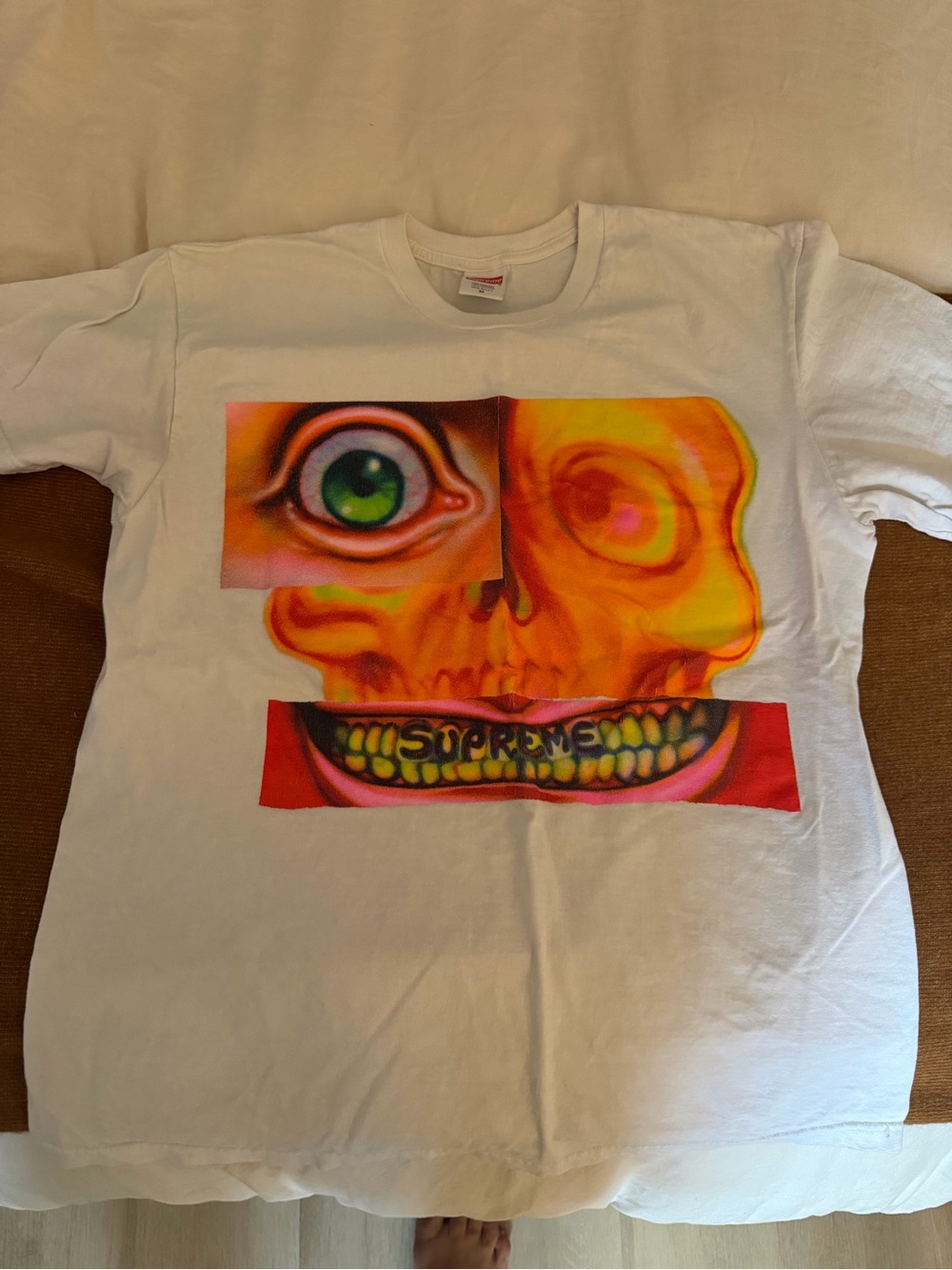 Supreme White Tee with Vibrant Orange Skull and Multicolor Eye